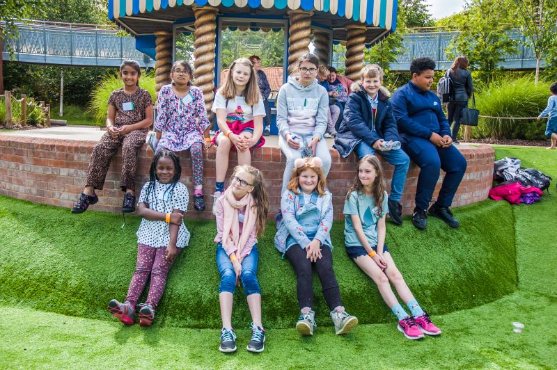 Group of children outside smiling