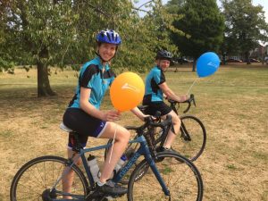 man and woman on charity bike ride