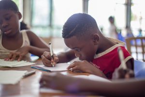 School children writing