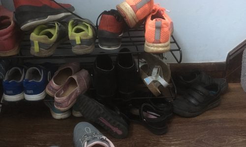 messy rack of shoes