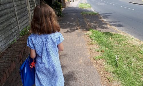 Child walking alone to school