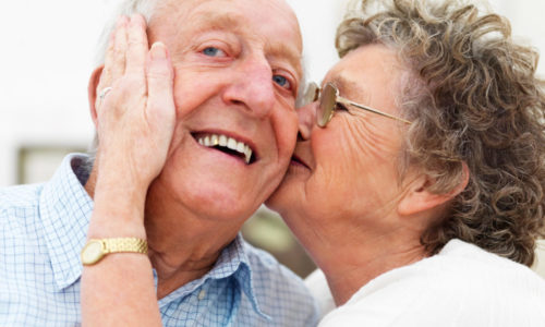 Happy-elderly-couple-embracing