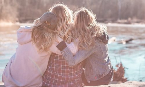 Two girls with mother