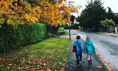 autumn children walking to school