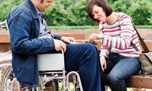 young-couple-man-is-uses-wheelchair