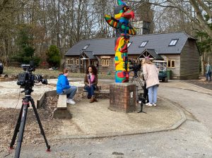 BBC Sarah interviewing a young carer outsside at Walton Firs