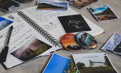 journaling and scrapping book open with photos and writing