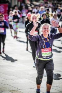 Women running in half marathon