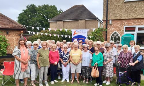 Guildford homemakers - group photo of 20 ladies who fundraise for Action for carers Surrey